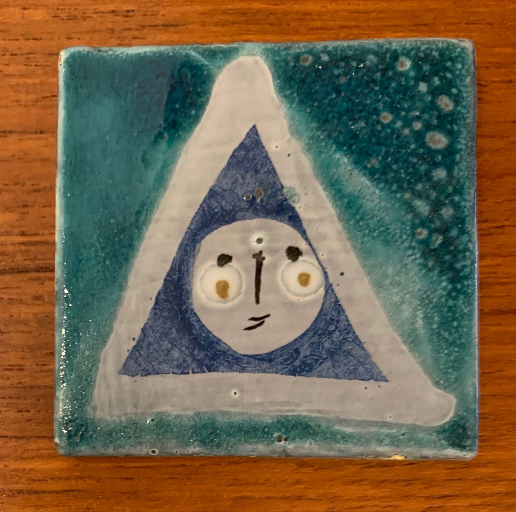 Small tile (Blue face 1) by Roger Capron
