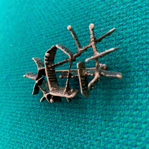 Abstract brooch in sterling silver by Else & Paul Hughes, Norway